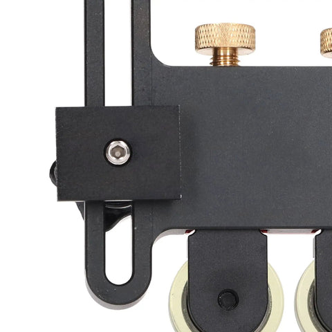 Close-up of Heavy Duty Aluminum Alloy Featherboard Table Saw Feeder with dual polyurethane wheels for stability.