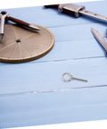 Pro Grade Stainless Steel Eye Bolt M10x60 With Nut And Flat Washer on wooden desk with compass and tools