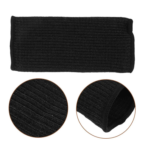 Heavy Duty Cut Resistant Arm Sleeves Built Tough For Serious Yard And Mechanic Jobs Deliver Rock Solid Forearm Protection That Truly Holds Up Through Long Days In Matte Black, close-up view of ribbed fabric.