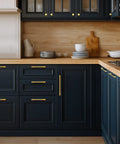 20 Pack Built Tough Brushed Brass Gold Kitchen Cabinet Pulls 5 Inch Heavy Duty Drawer Handles showcased on navy cabinets.