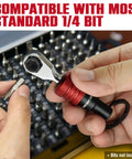 Hands holding EDC Mini Ratchet Wrench with One Quarter Inch Hex End and Bit Holder for Quick Bit Changes near a tool set.