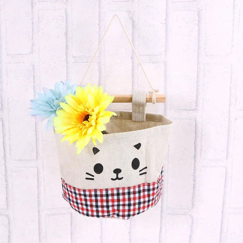 Wall Mounted Hanging Storage Bag Organizer With Solid Wooden Bar For Closets And Doorways Offers Nifty Multi Pockets For Remotes And Keys With Zero Drama Setup, featuring floral decor.