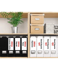 Ultra Fast Network Label Printer With Bluetooth And Ethernet Wireless Connectivity Slick Monochrome Printing Up To One Hundred Ten Labels Per Minute on an organized shelf with labeled file folders.