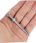 Hand holding 7 cm metal spike for Ten Piece Lawn Aerator Shoes With Metal Spikes For Deep Soil Aeration And Healthier Grass Growth.