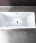 Contemporary 67 Inch Freestanding Acrylic Soaking Bathtub With Matte Black Drain And Overflow Deep Luxury Spa Tub For Modern Bathrooms, top view.