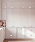 Pink Bow Dresser Knob Set With 30 Knobs And 90 Screws, 1.57 Inch Aluminum Alloy Handles on white kitchen cabinets.