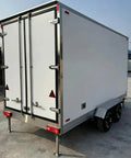 Sleek Portable Refrigerated Trailer Featuring Heavy Duty Mobile Cooling System For Catering Teams And Large Outdoor Events rear view with double doors.