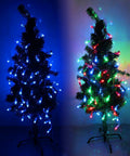 Lit 500 Pack WS2811 LED Pixel String Lights, 12mm Round, Waterproof IP68, on tree with blue and multicolor modes visible.