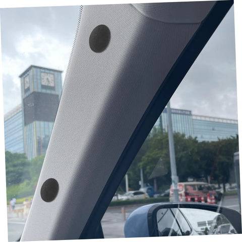 Close-up of Automotive Headliner Repair Kit With Black Snap Rivets, 12-Set Ceiling Fabric Fixers For Cars installed on car interior.