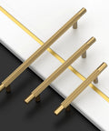 Set of three champagne bronze knurled handles on a black and white surface, includes Champagne Bronze Knurled 3 Inch (76mm) Cabinet Handles 10 Pack for Kitchen Cabinets Cupboards Drawers Durable Cabinet Hardware Pulls Ergonomic Grip Easy to Install.