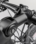 Close-up of adjustable bike handlebar stem extender fits 31.8mm bars and 28.6mm steerer on MTB road BMX, boosts ride height.
