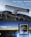 Close-up of Elite 16 Channel ELRS Transmitter With EdgeTX featuring foldable antenna and STM32 H7 technology.