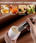 Person holding Solid Eight Ounce Leather Repair Balm And Detail Brush Kit near shea butter and jojoba oil on leather fabric.