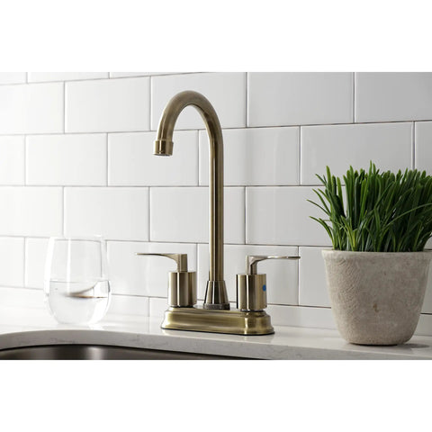 Serena Two Handle Deck Mount Bar Faucet In Antique Brass With Two Hole Four Inch Centerset Washerless Cartridge Half Inch To Fourteen NPSM Connection 1.8 GPM Flow Solid Brass Build For Your Home Bar installed on countertop