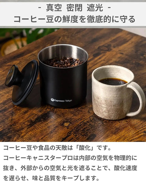 Premium Vacuum Sealed Coffee Canister With Airtight Seal And Light Proof Stainless Steel Keep Your Beans Crispy For That First Sip Magic No More Stale Vibes Great Daily Storage Option From Japan with coffee beans in a black stainless steel container.