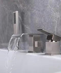 Modern Roman Tub Faucet With Hand Shower And Waterfall Spout Dope Look Brushed Nickel Widespread Deck Mount Tub Filler With Sprayer Three Hole Design DOE Certified Lead Free Valve Easy Install in brushed nickel finish viewed from the side with water flowing.