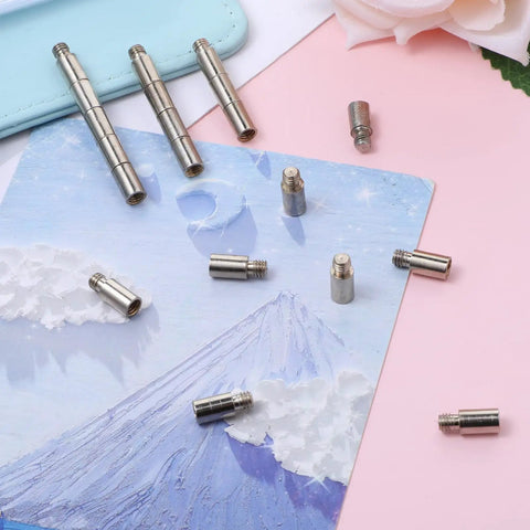 Heavy Duty 20 Piece Scrapbook Extension Posts And Bookbinding Screws Rust Proof Copper 12 Millimeter Spacer Rings for Plug And Play Photo Album Refills, shown on a colorful background.