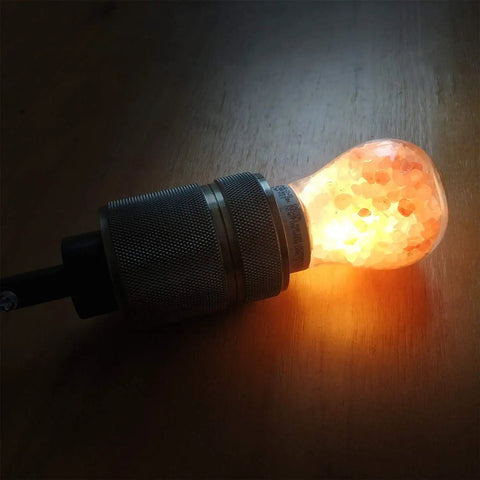 Warm Amber LED Bulbs 60W Equivalent, Dimmable E26 Edison Base, Salt Lamp Vibe Glow on wooden surface