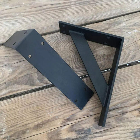 Rock Solid Floating Shelf Brackets Heavy Duty Tripod Wall Supports That Hold Up Like Champs Slick Black Iron Rack Mounts close-up view.