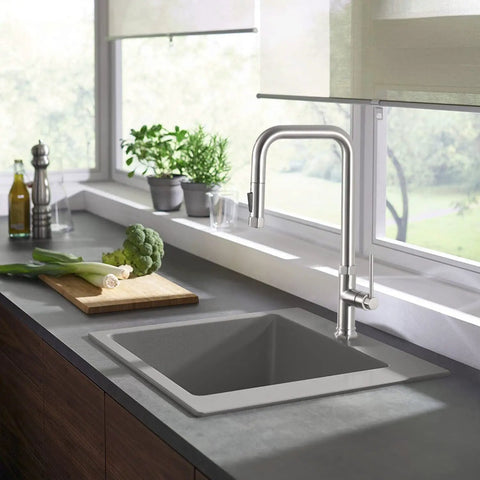 Pull Down Kitchen Faucet With Dual Function Spray Head Single Handle Deck Plate Included Fits 1 Or 3 Hole Sinks Brushed Nickel Finish Modern Look For A Simple Kitchen Upgrade installed in a modern kitchen setting
