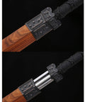 Detail of hand-forged Damascus Han Sword With 42-Inch Battle-Ready Chinese Longquan Blade and rosewood scabbard kirsite fittings.