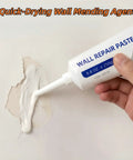 Fast Dry Wall Repair Paste Kit With Scraper For Quick Hole And Crack Patches being applied to wall crack