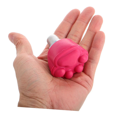 Hand holding pink rubber toe stop for quad skates, part of Toe Stops For Quad Skates, Rubber Roller Skate Brakes Plugs lineup.