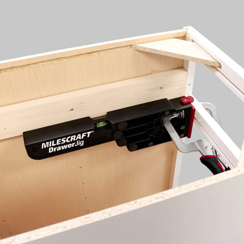 Drawer Installation Jig Reversible With Built In Level And Non Marring Rubber For Cabinet Protection in use on cabinet