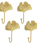 Four gold Ginkgo Leaf Wall Hooks, key holder and hat hanger, modern rustic style, wall-mounted for home, office, nursery decor.