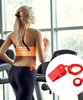 Woman jogging on treadmill featuring Universal Treadmill Safety Key Replacement With Emergency Stop Magnet accessory, red PVC key visible.