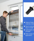 A person installing Tough As Nails Window Shutter Repair Pins Heavy Duty Iron And Pp Replacement Set Black 50 Piece Pack in a window.
