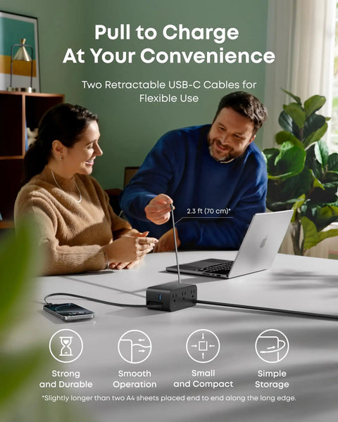 7 In 1 Desk Charging Station with 100W USB C Power Hub on desk, two people using laptops, retractable InstaCord cable visible