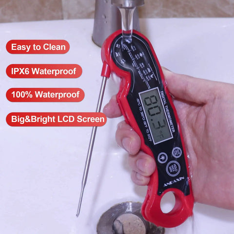 Digital meat thermometer being rinsed under water, waterproof design emphasized, LCD display visible, hand holding thermometer
