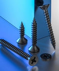 385 Piece Flat Head Black Wood Screws Set With Self Tapping Metal Screws And Drywall Anchors Kit beside blue surface