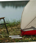 16 Piece Aluminum Tent Pole Repair Tube Connector Kit For Snappy Pole Fixes And Lightweight Camping Accessory For Dome Cabin Tents Perfect For Camping Trips And Easy Assembly next to a tent.