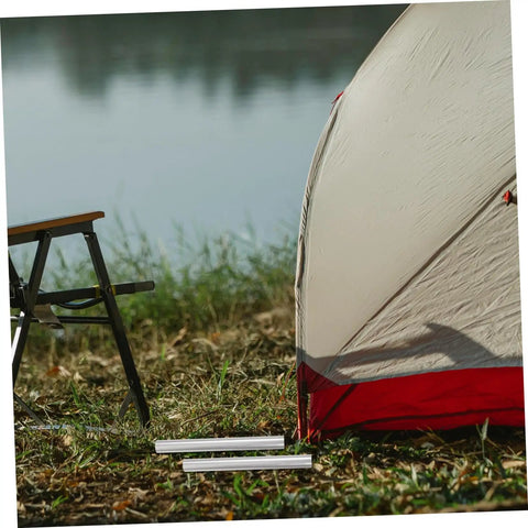 16 Piece Aluminum Tent Pole Repair Tube Connector Kit For Snappy Pole Fixes And Lightweight Camping Accessory For Dome Cabin Tents Perfect For Camping Trips And Easy Assembly next to a tent.