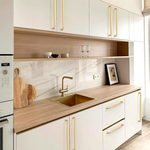 Talentedeco 10 Pack Brushed Gold Kitchen Cabinet Pulls on modern kitchen cabinetry with wood and gold accents.
