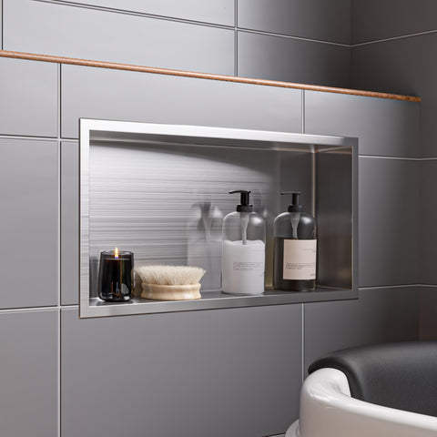 Ready To Mount 24 X 12 Inch Brushed Stainless Steel Bath Shower Niche With Horizontal Single Shelf No Tile Work Needed Ultra Durable Easy Clean Sleek Built In Storage For A Modern Budget Friendly Bathroom Upgrade displaying bath products in a gray tiled shower wall.