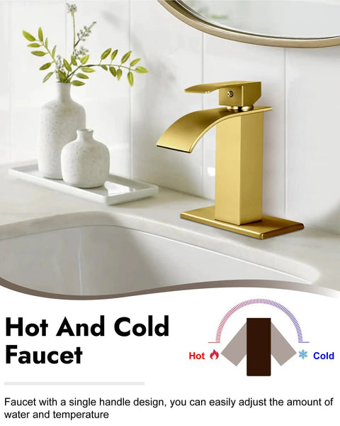 Gold waterfall spout single handle bathroom faucet in modern design on white sink with decorative vases.