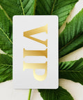 20 Pack Of Top Shelf Blank White Pvc Id Cards Sized At 85X54MM Crafted For Straight Up Double Sided Printing And Easy Sublimation Badge Maker Projects That Pop, with gold VIP text on a background of green leaves.