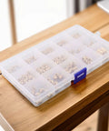 Brass Threaded Inserts Kit For 3D Printing, 300Pcs M2 To M6 And 1/4-20 in transparent storage box on wooden table
