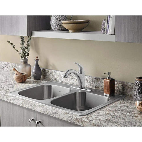 Colony Pro Pull Out Kitchen Faucet with Dope Sprayer and Ceramic Disc Valve mounted on granite countertop in polished chrome finish