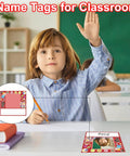 Kid Friendly Photo Desk Nameplates Set 36 Self Adhesive Name Tags With Photo Space For Classrooms And Desks in use by a student