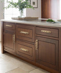 Champagne Bronze Cabinet Pulls With Backplates, 2 Pack, 5 Inch Center to Center on wooden kitchen cabinets.