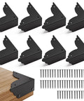Top Notch Eight Piece Antique Bronze Corner Protectors Slick Edge Guards For Desks And Tables on wooden surface with nails.