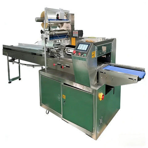 Flow Wrapper Compact Packaging Machine With 50 To 80 Pieces Per Minute, stainless steel design, for snack and home packaging use.