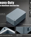Heavy Duty Cast Aluminum Project Box With IP66 Waterproof Rating Tough As Nails High Strength Heat And Cold Resistant Junction Enclosure Electrical Storage Cabinet 7.4 X 4.7 Inches, gray box with mounting screws and sealing strip.
