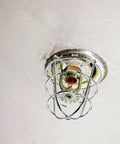 Heavy Duty Fire Sprinkler Head Covers 2 Pack Tool Free Impact Blocker For Vandalism installed on a smooth ceiling.
