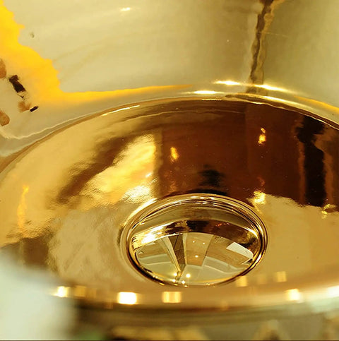 Close-up view of Top Shelf Gold Ceramic Round Vessel Sink For Bathroom Countertop Vanity Setup, showing shiny inner surface.