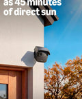 Ditch The Cords Hassle Free Solar Smart Security Camera With True 2K Video Feed And Sync Hub Included For Bulletproof Home Protection mounted on exterior wall.